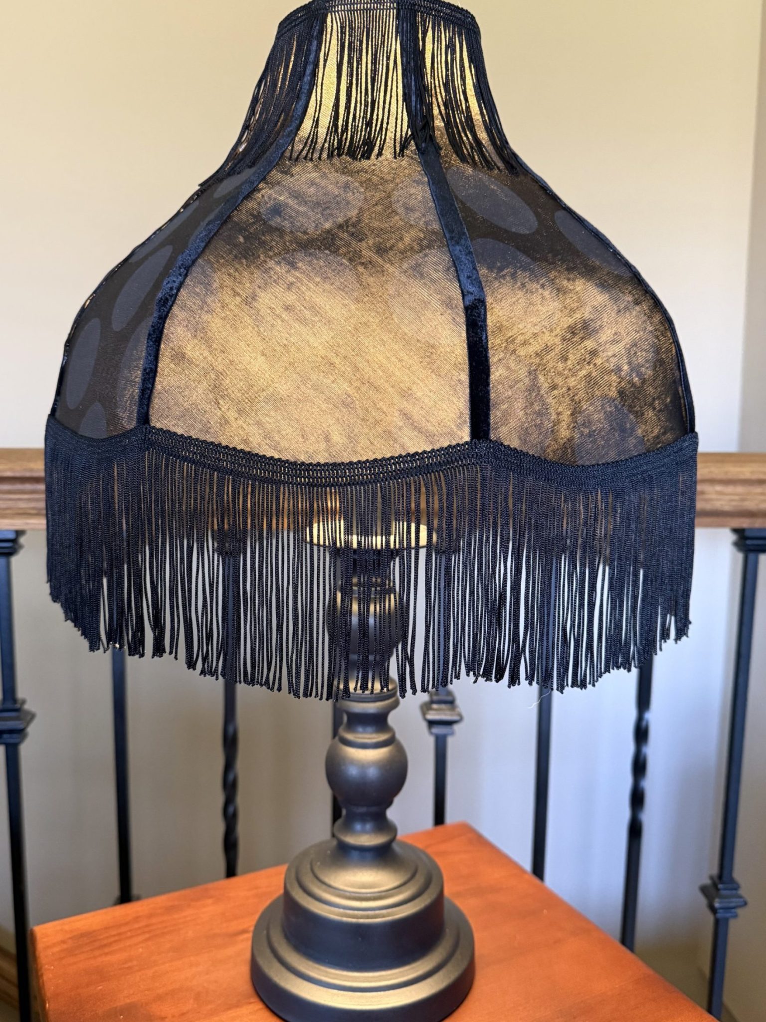 black lamp with fringe – bulb on black lamp with fringe - bulb on